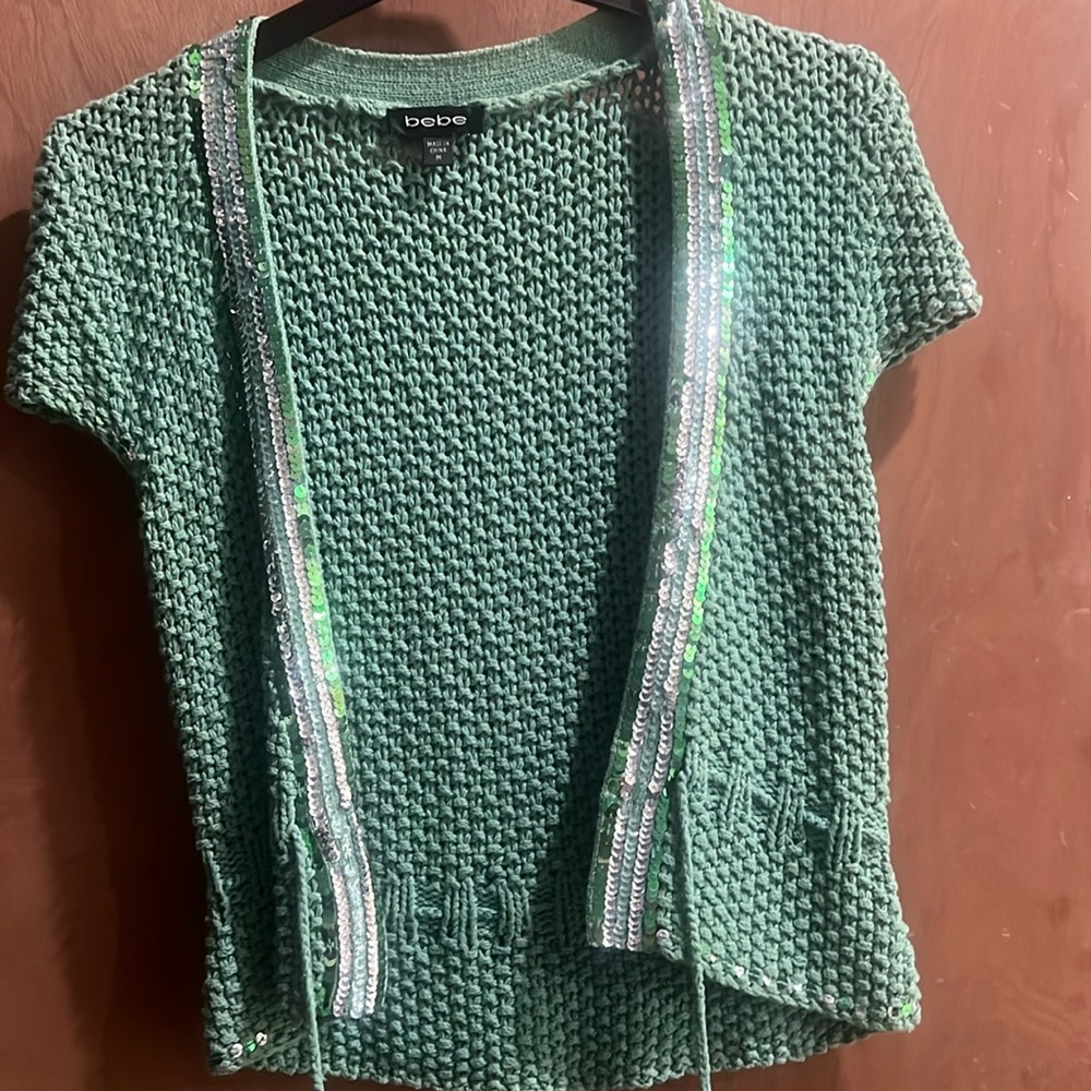 Medium green Bebe vest sweater.